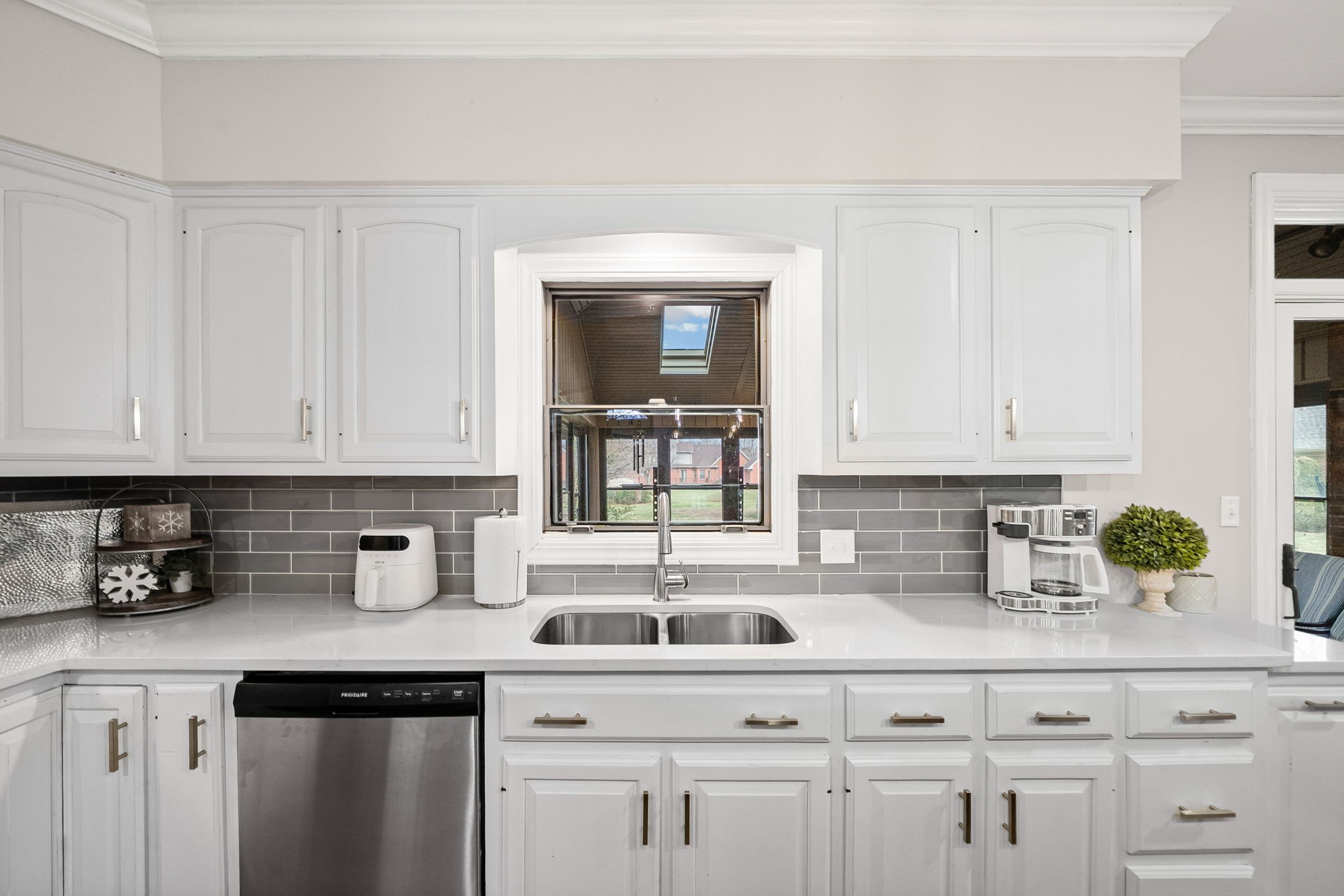 508 Sheffield Road Hopkinsville, KY 42240 - Photo 17 of 65 a kitchen with white cabinets and sink