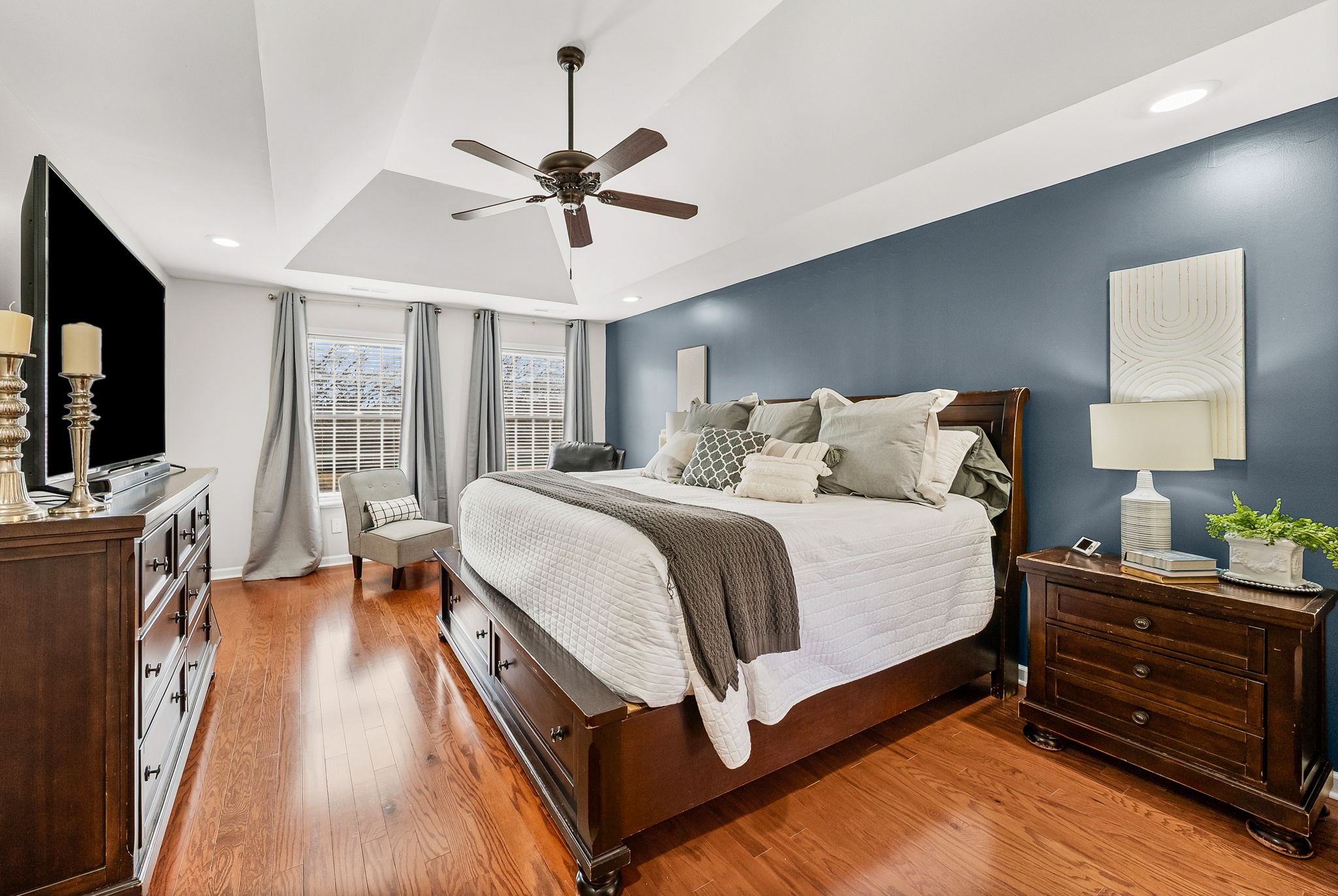 508 Sheffield Road Hopkinsville, KY 42240 - Photo 30 of 65 a bedroom with a bed and wooden floor