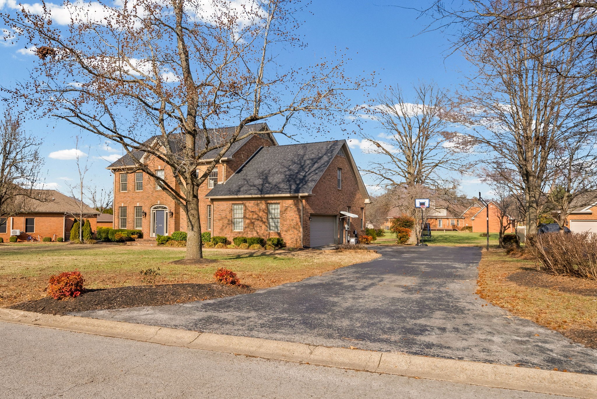508 Sheffield Road Hopkinsville, KY 42240 - Photo 3 of 65 a view of a large white house with a yard covered in snow