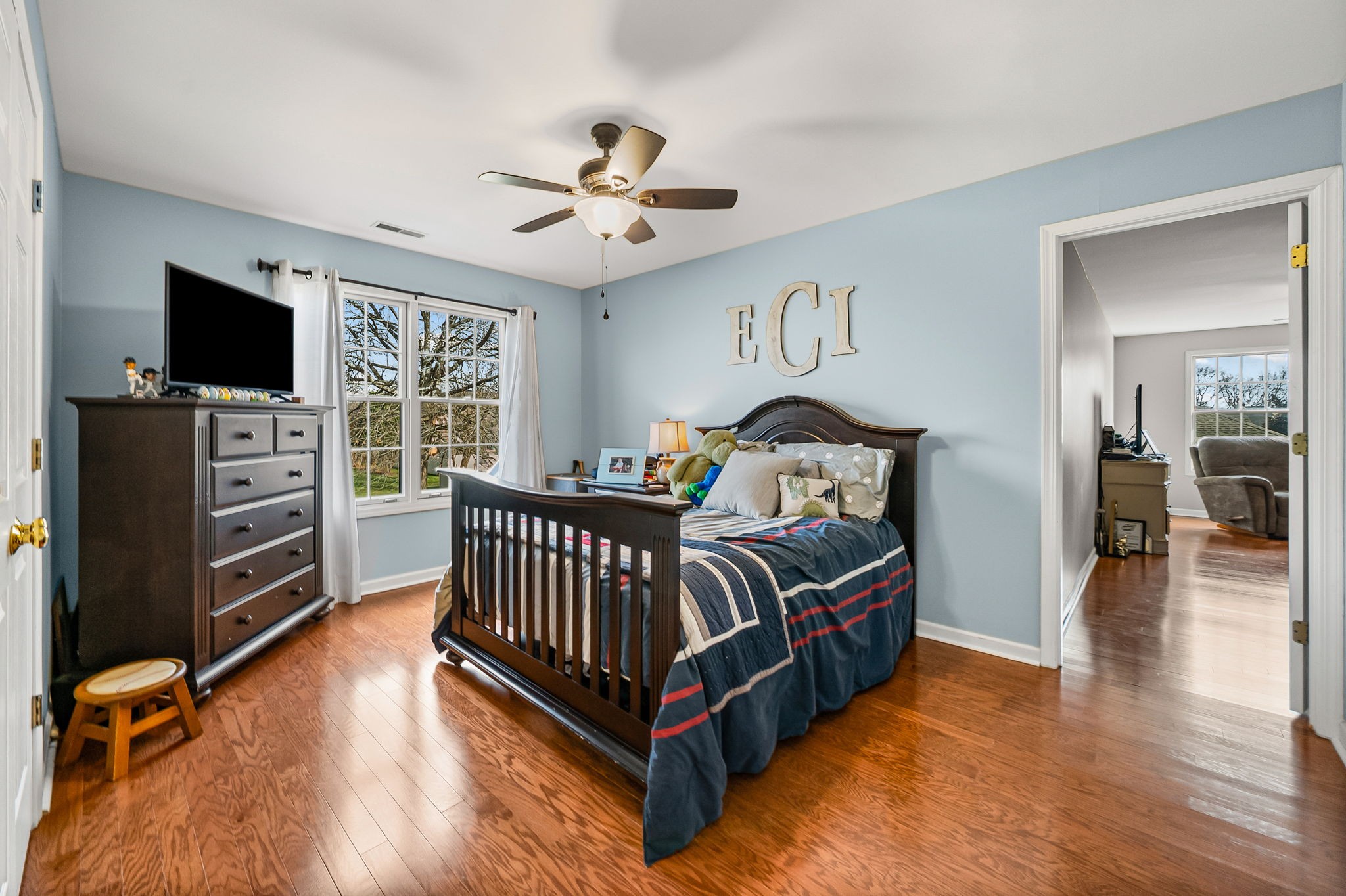 508 Sheffield Road Hopkinsville, KY 42240 - Photo 40 of 65 a bedroom with furniture and flat screen tv