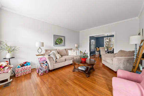 a open kitchen with stainless steel appliances granite countertop a lot of counter space and wooden floor