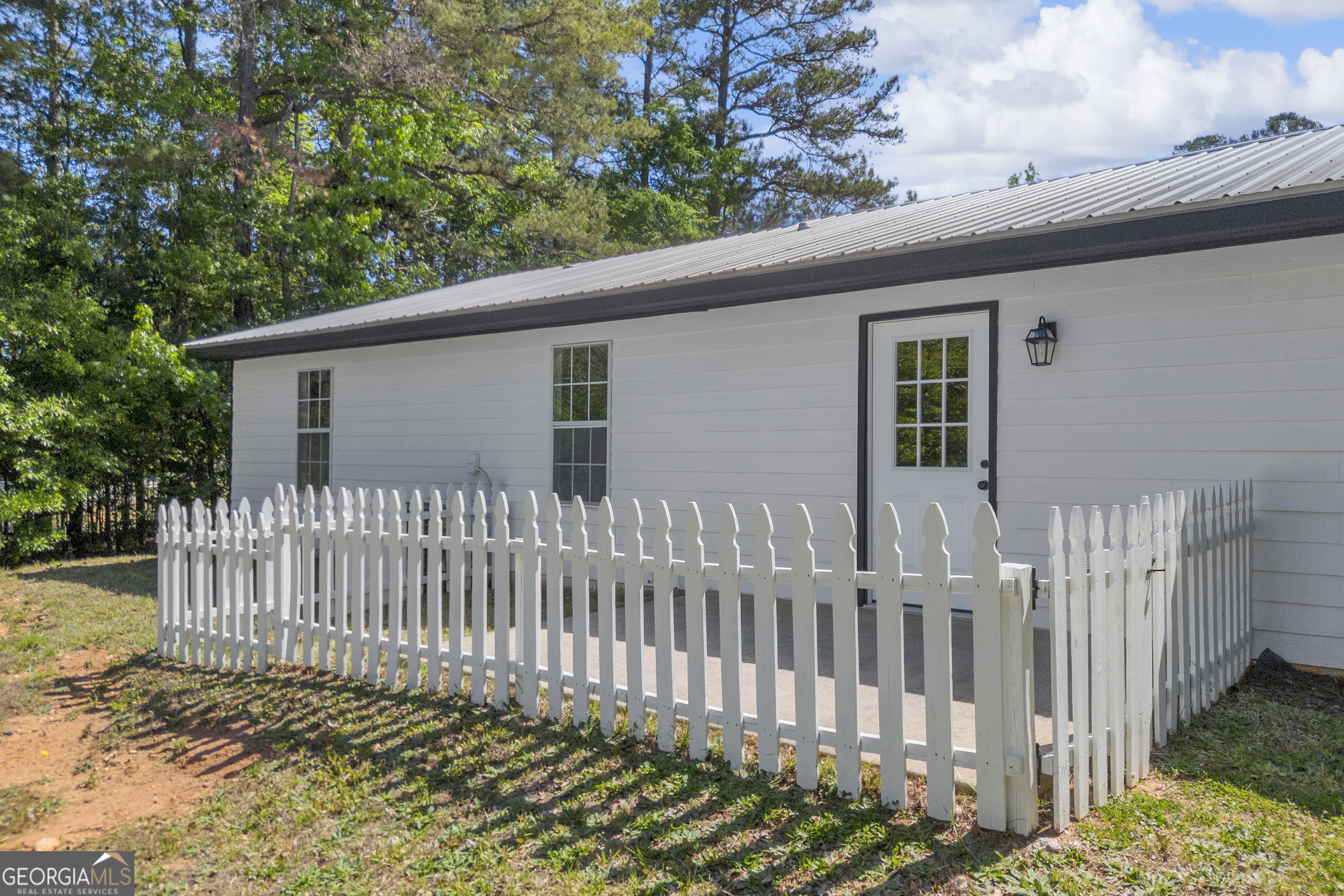 248 Highland Estates Commerce, GA 30529 - Photo 12 of 57 a view of a house with a small yard