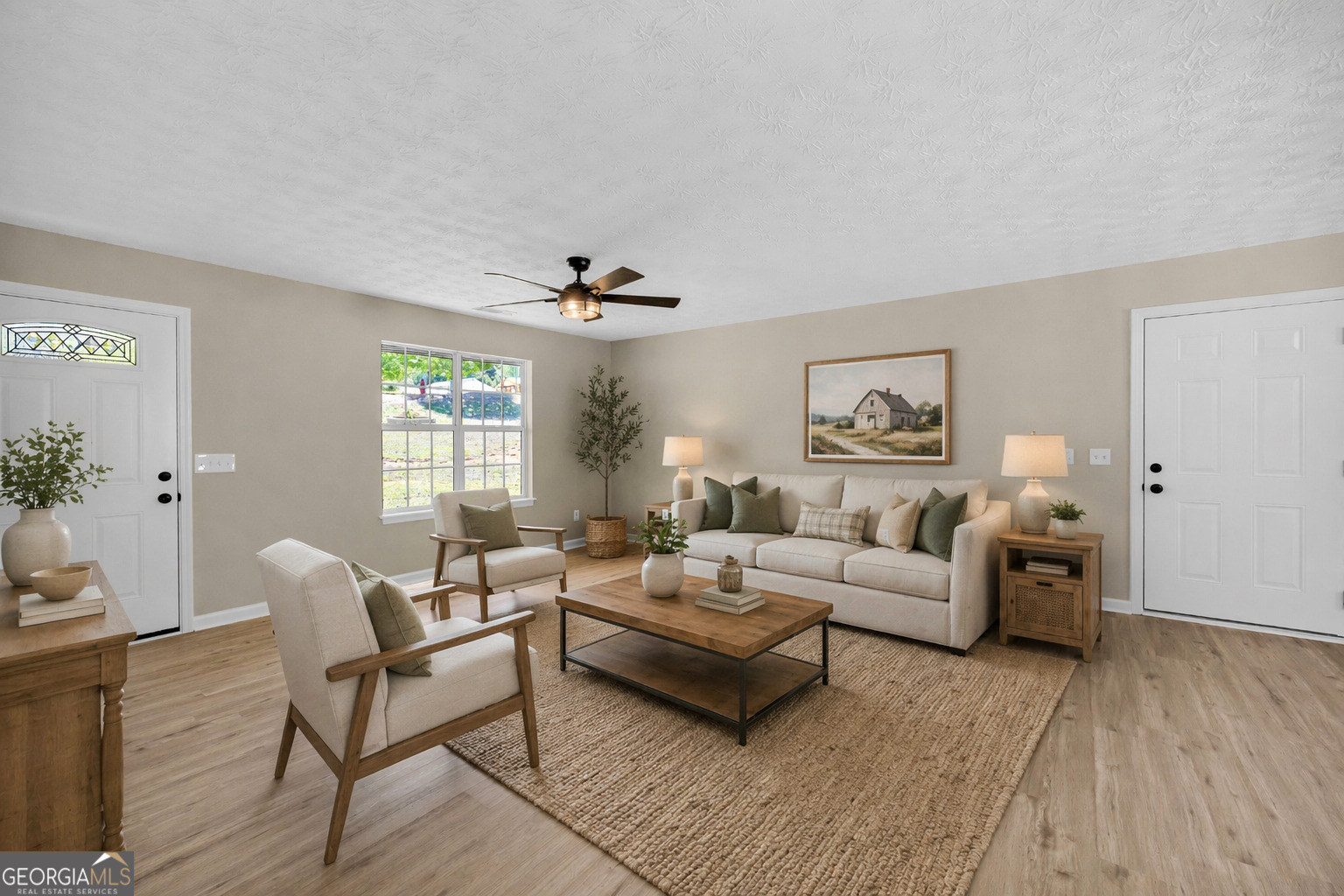 248 Highland Estates Commerce, GA 30529 - Photo 17 of 57 a living room with furniture and a wooden floor