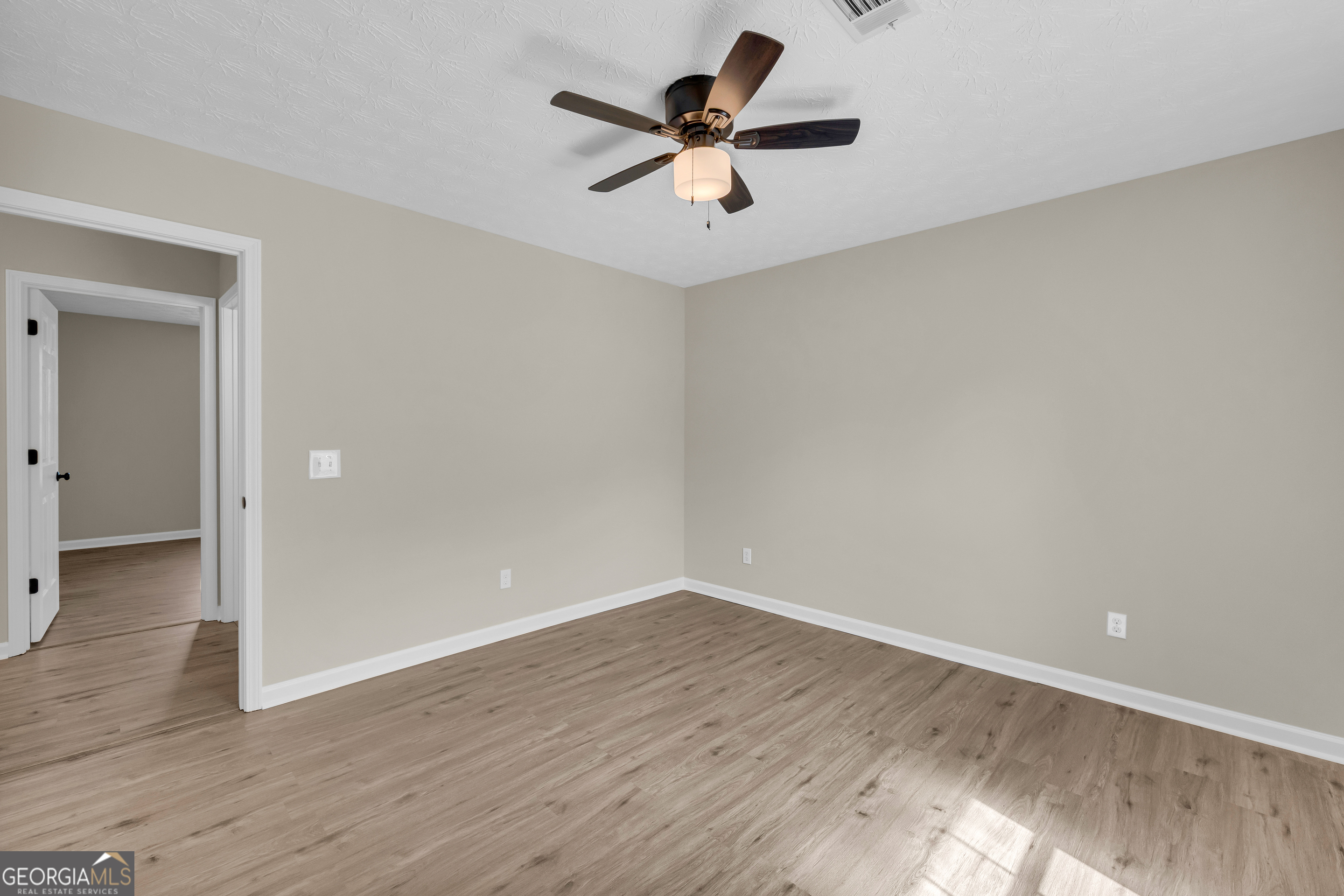 248 Highland Estates Commerce, GA 30529 - Photo 37 of 57 wooden floor in an empty room with a window