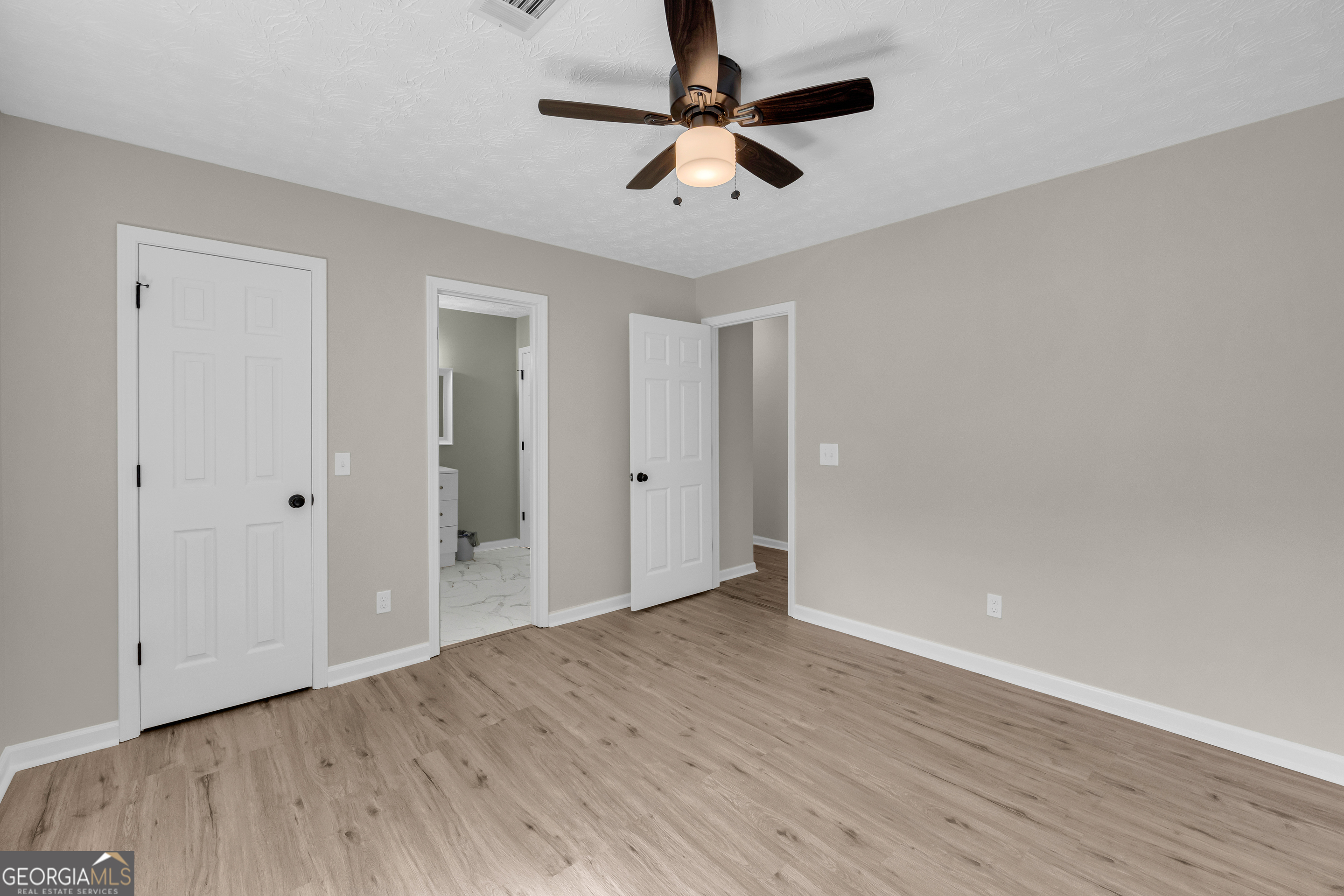 248 Highland Estates Commerce, GA 30529 - Photo 38 of 57 a view of empty room with wooden floor