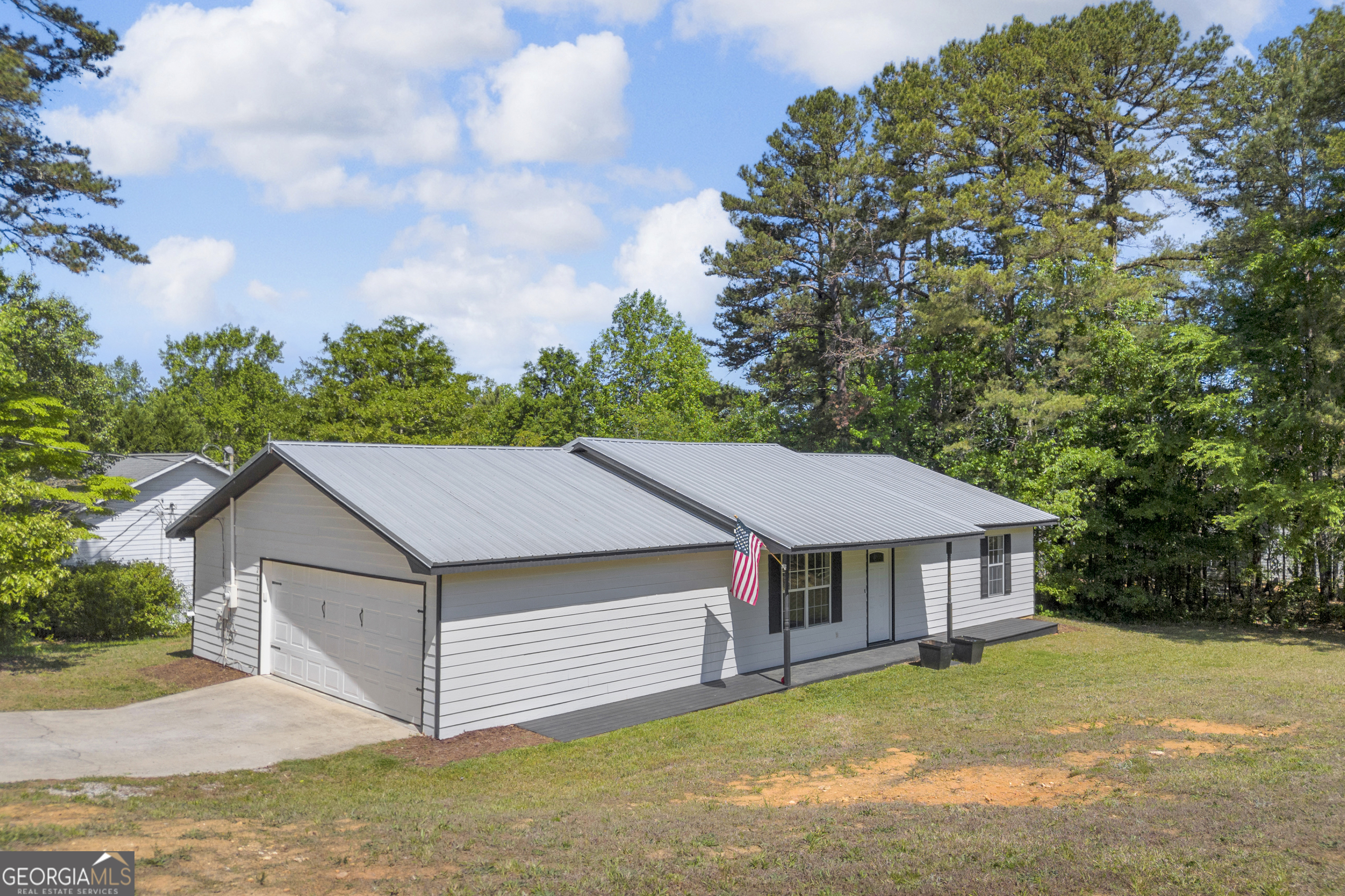248 Highland Estates Commerce, GA 30529 - Photo 5 of 57 a house with trees in the background