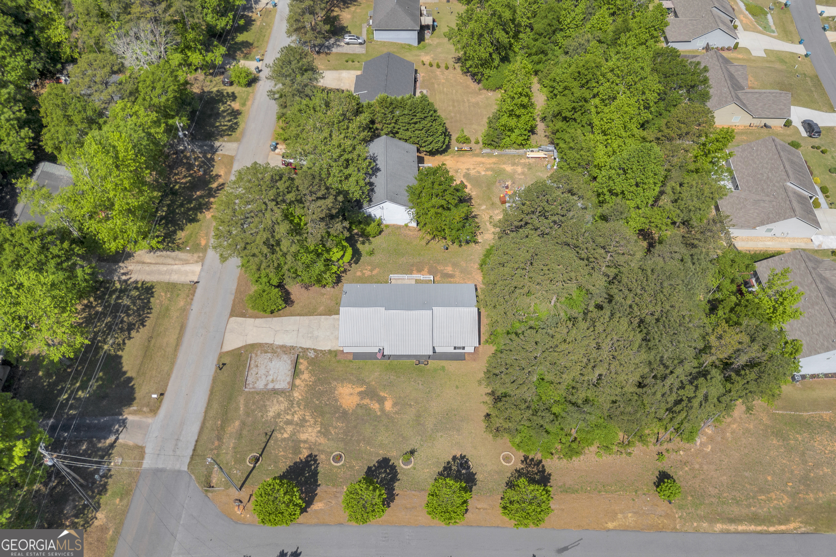 248 Highland Estates Commerce, GA 30529 - Photo 57 of 57 an aerial view of a house with a yard