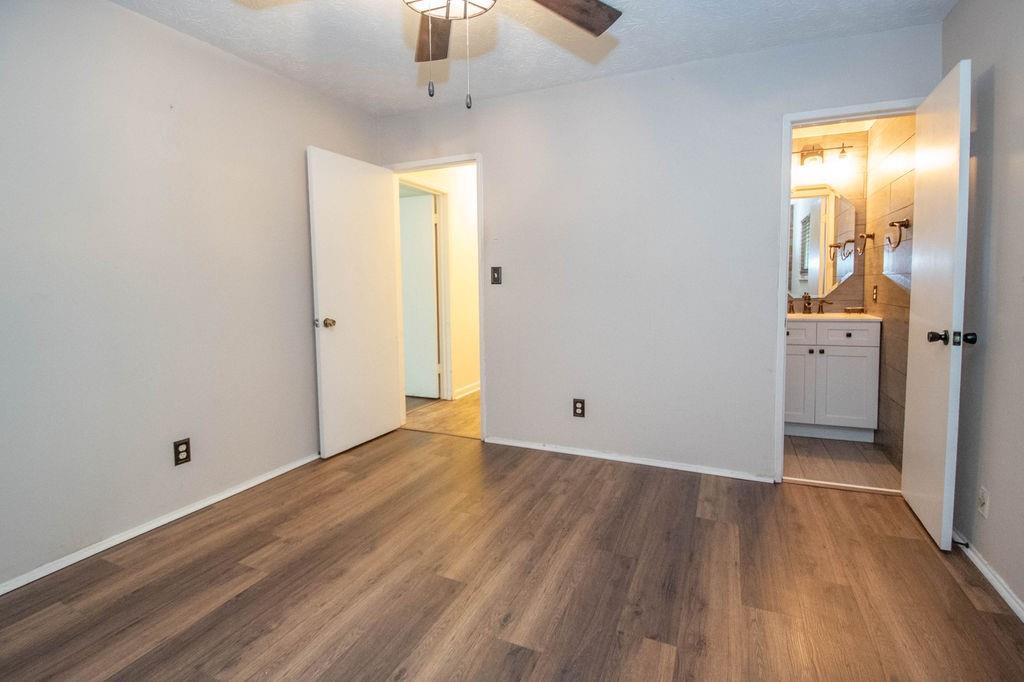 6200 Fieldcrest Drive Morrow, GA 30260 - Photo 12 of 19 wooden floor in an empty room with a window