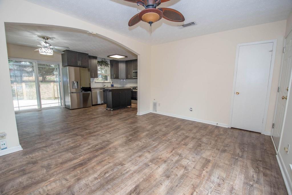 6200 Fieldcrest Drive Morrow, GA 30260 - Photo 4 of 19 a view of a kitchen with a sink stainless steel appliances and cabinets