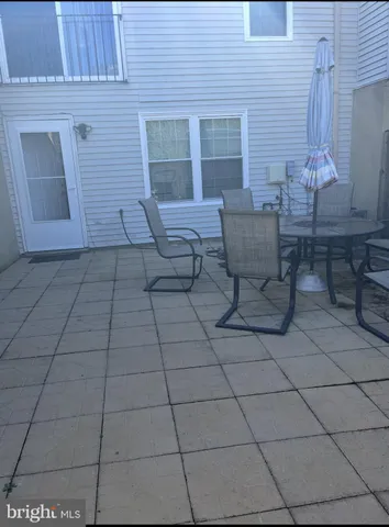 a view of a terrace with seating space