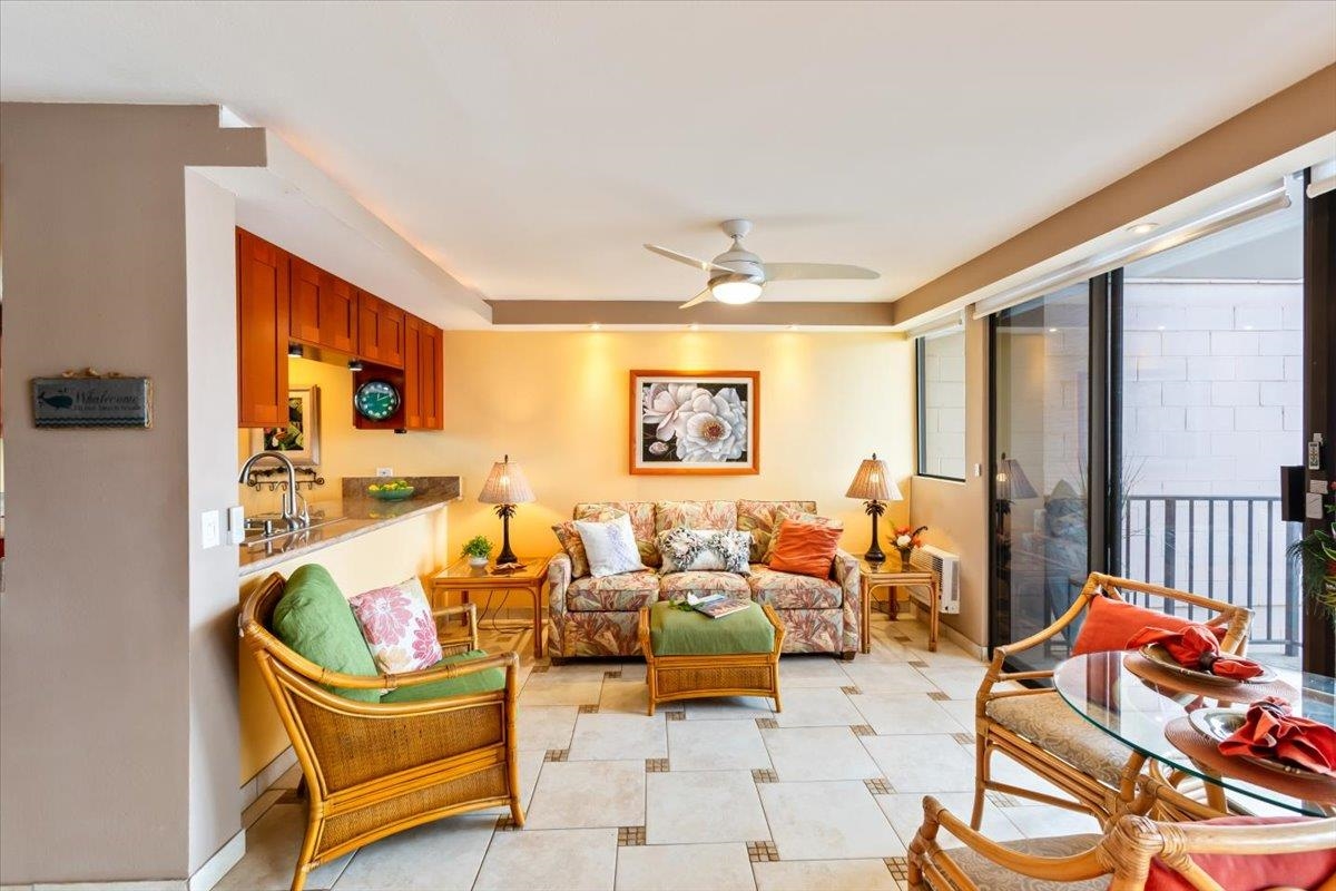 191 North Kihei Road, Unit 402 Kihei, HI 96753 - Photo 15 of 48 a living room with furniture and a flat screen tv