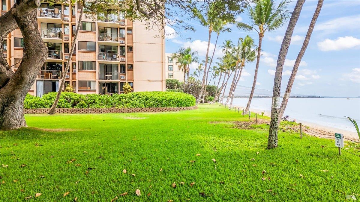 191 North Kihei Road, Unit 402 Kihei, HI 96753 - Photo 30 of 48 a view of building with yard