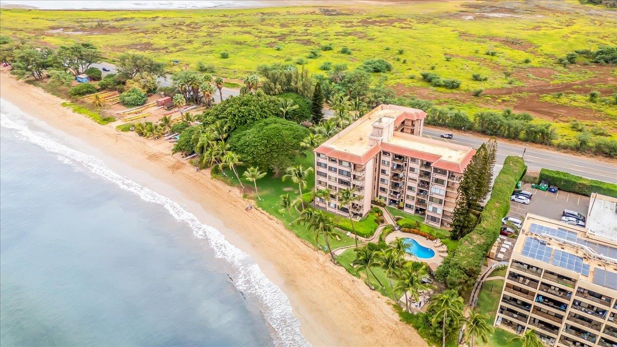 191 North Kihei Road, Unit 402 Kihei, HI 96753 - Photo 37 of 48 an aerial view of residential houses with outdoor space