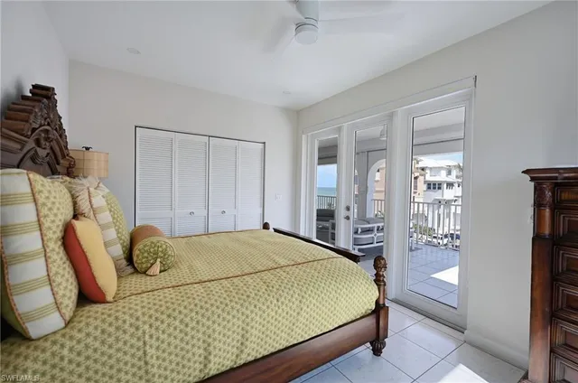 a bedroom with a bed and walk in closet