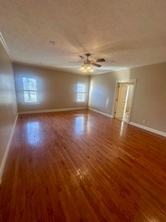 25 Max Drive Paris, TN 38242 - Photo 17 of 32 a view of empty room with wooden floor and fan