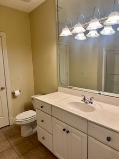25 Max Drive Paris, TN 38242 - Photo 22 of 32 a bathroom with a sink mirror and toilet