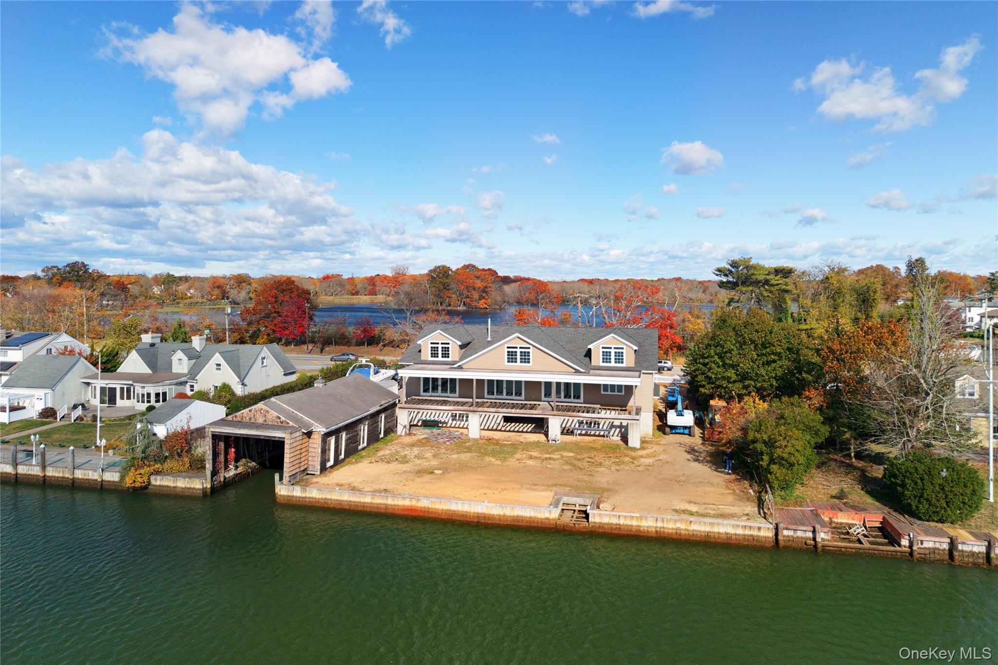 4530 Merrick Road Massapequa, NY 11758 - Photo 10 of 33 an aerial view of residential houses with outdoor space and trees