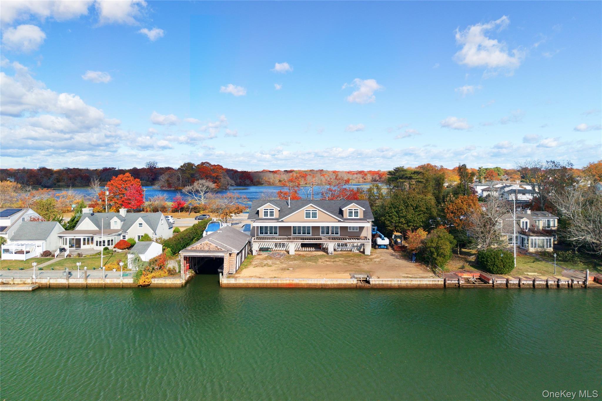 4530 Merrick Road Massapequa, NY 11758 - Photo 11 of 33 a view of a city with lots of residential buildings ocean and mountain view in back