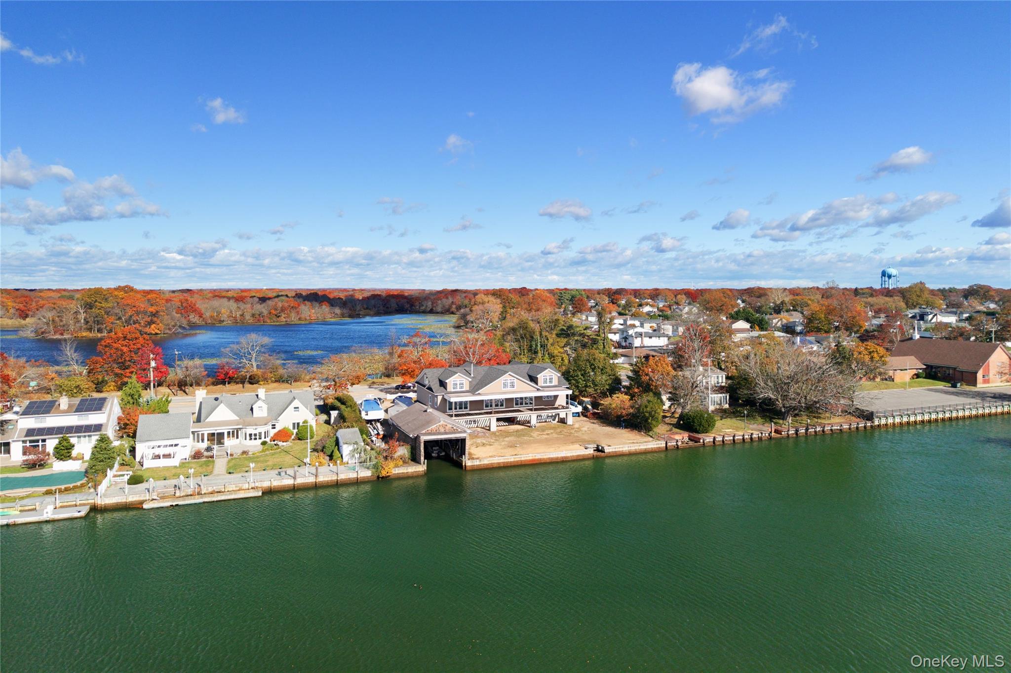 4530 Merrick Road Massapequa, NY 11758 - Photo 12 of 33 a view of a lake with outdoor space