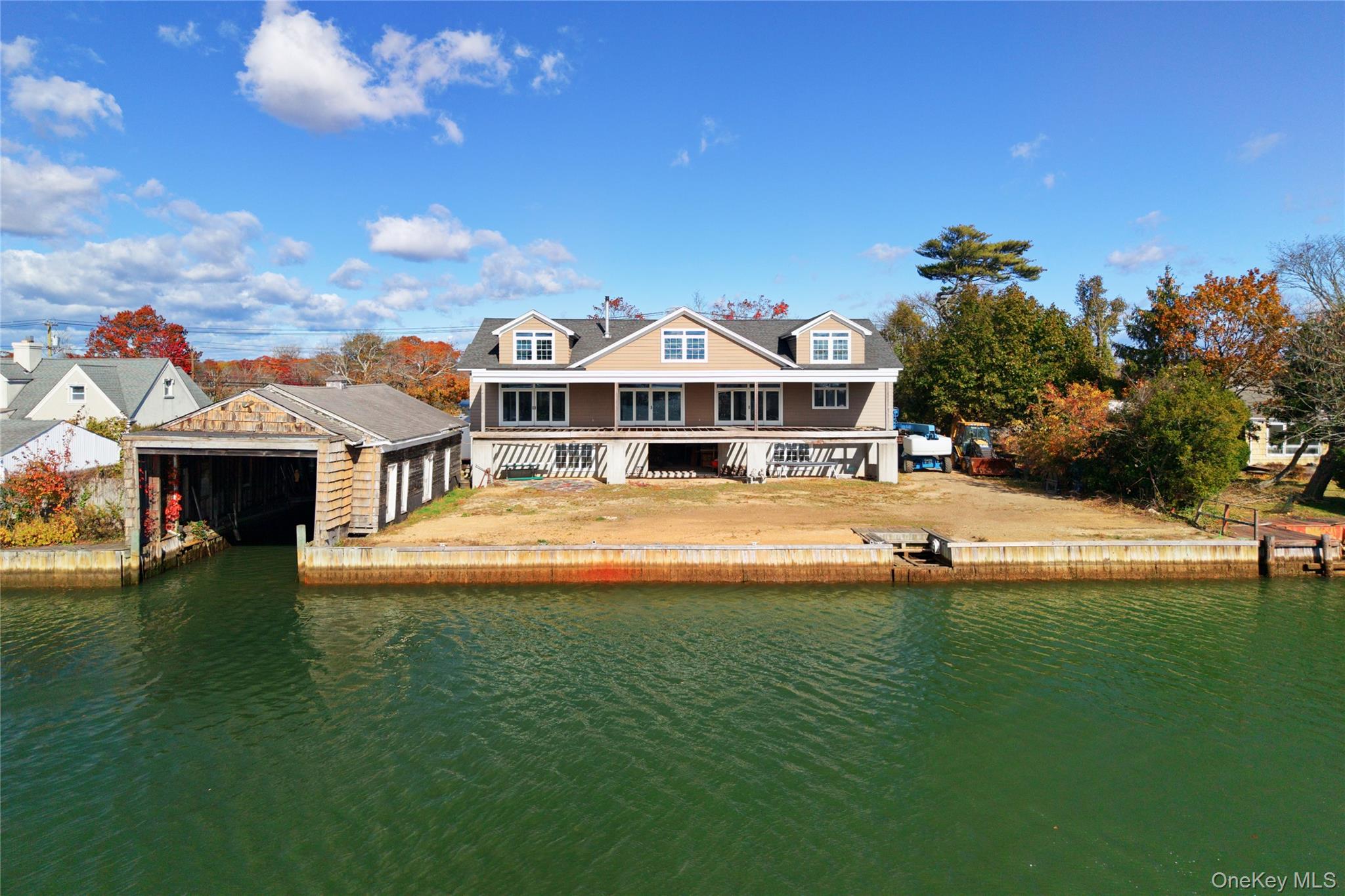 4530 Merrick Road Massapequa, NY 11758 - Photo 15 of 33 a view of a house with a big yard