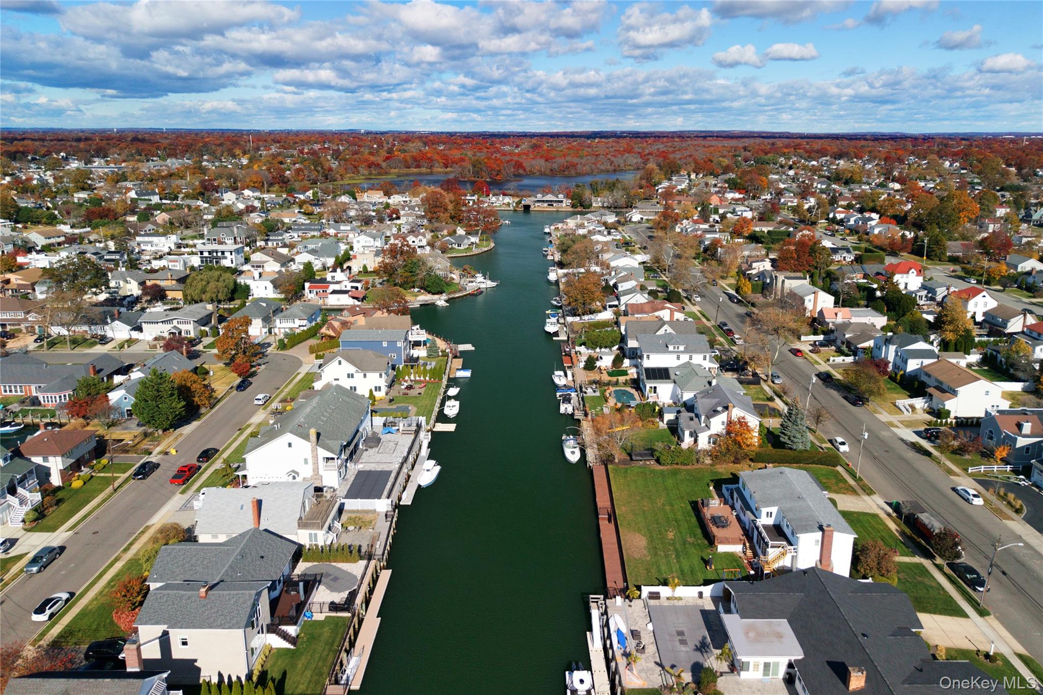 4530 Merrick Road Massapequa, NY 11758 - Photo 20 of 33 an aerial view of residential houses with outdoor space