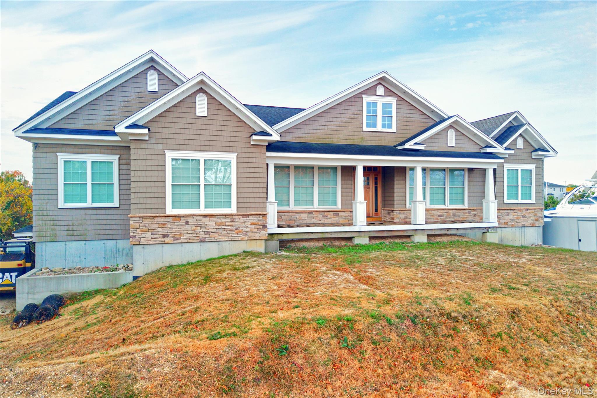 4530 Merrick Road Massapequa, NY 11758 - Photo 28 of 33 a front view of a house with a yard