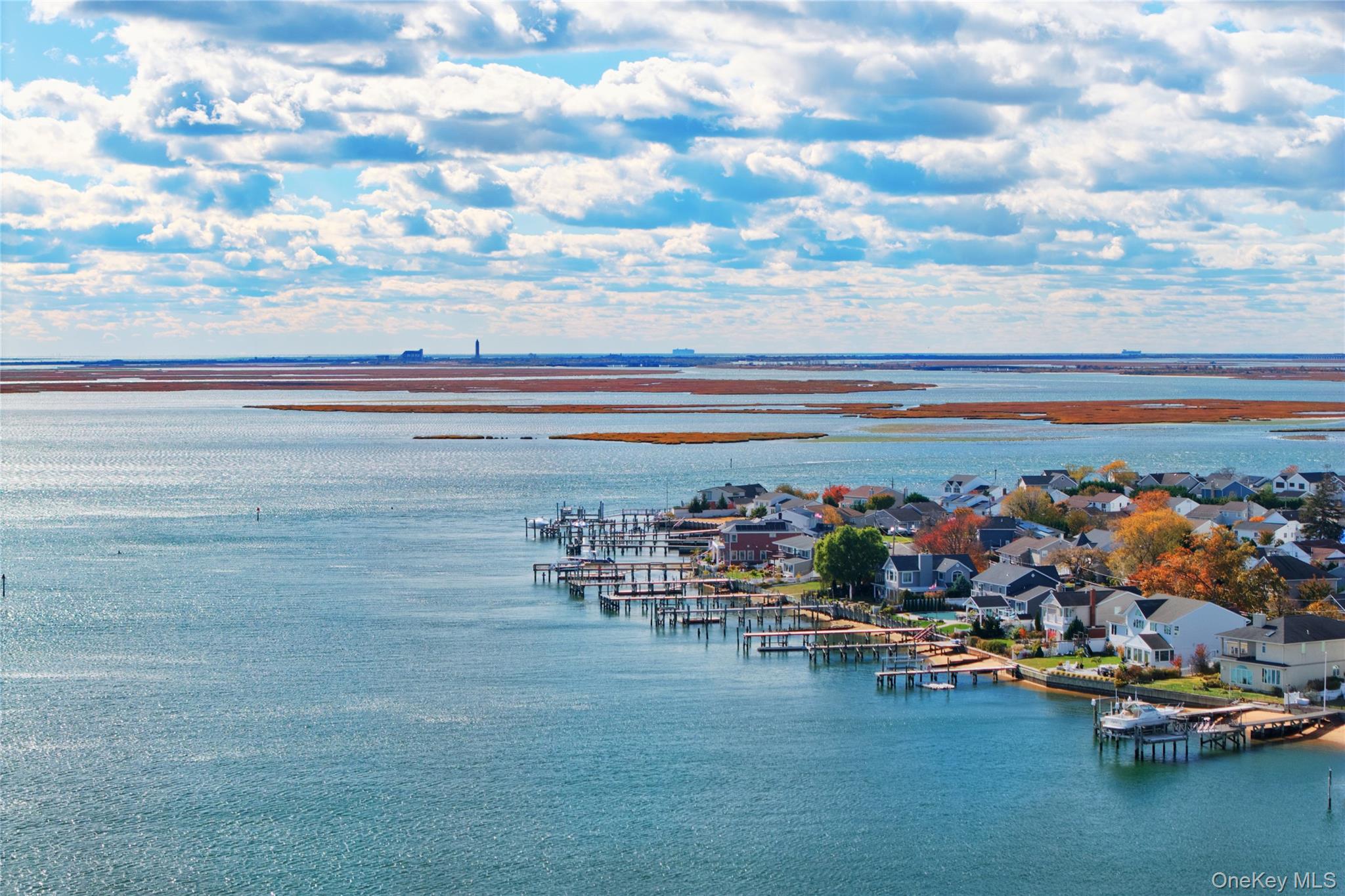 4530 Merrick Road Massapequa, NY 11758 - Photo 29 of 33 a view of a lake with outdoor space