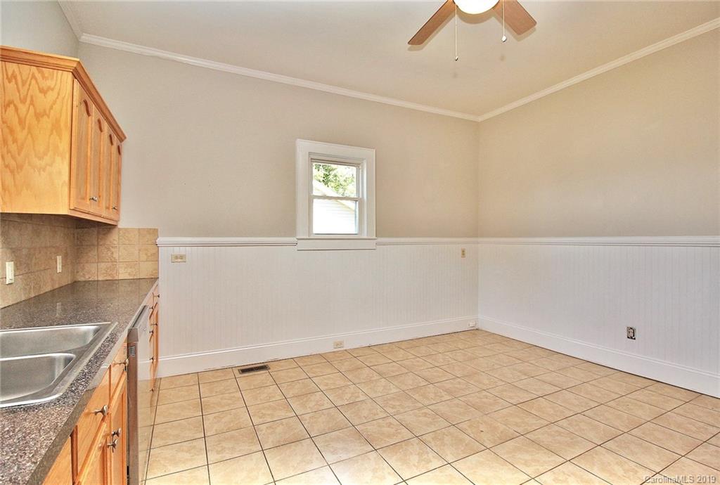 694 Main Street Southwest Concord, NC 28027 - Photo 17 of 33 a view of a kitchen that shows a sink cabinets and a window