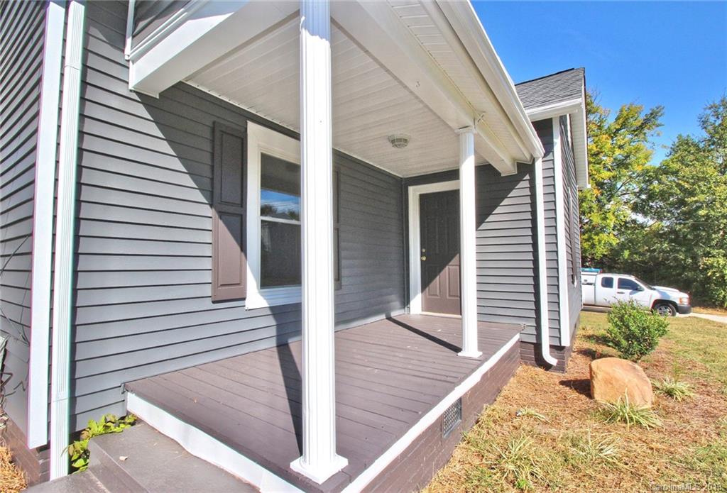 694 Main Street Southwest Concord, NC 28027 - Photo 3 of 33 a view of a house with a balcony