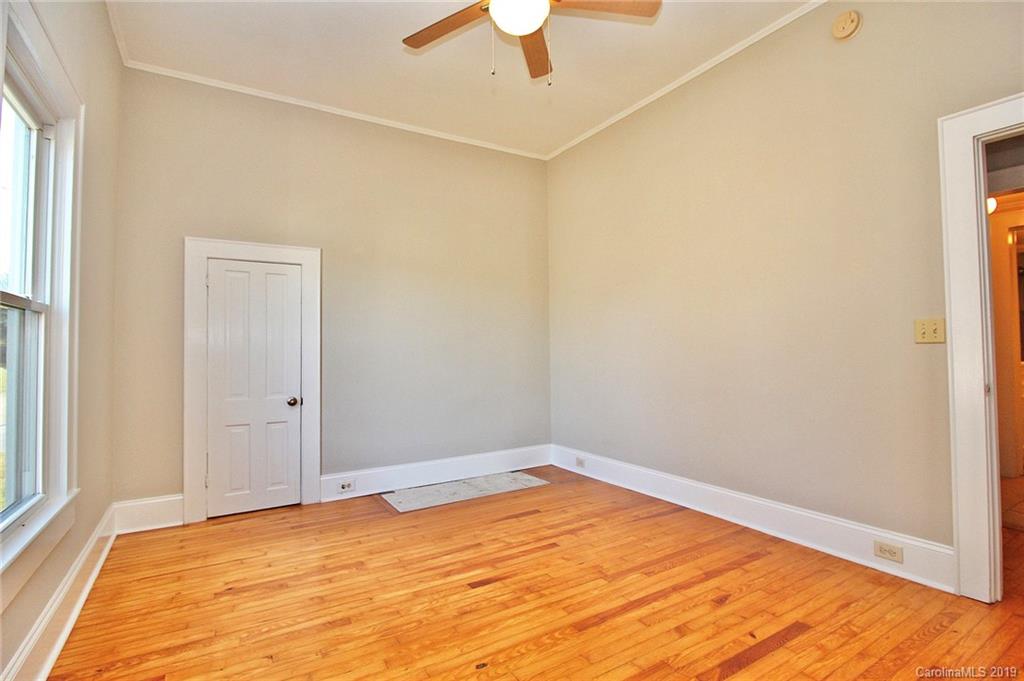 694 Main Street Southwest Concord, NC 28027 - Photo 21 of 33 a view of empty room with wooden floor