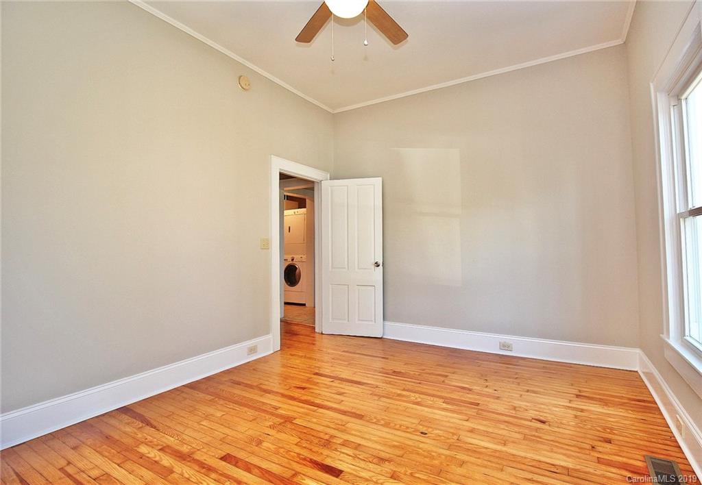 694 Main Street Southwest Concord, NC 28027 - Photo 23 of 33 wooden floor in an empty room