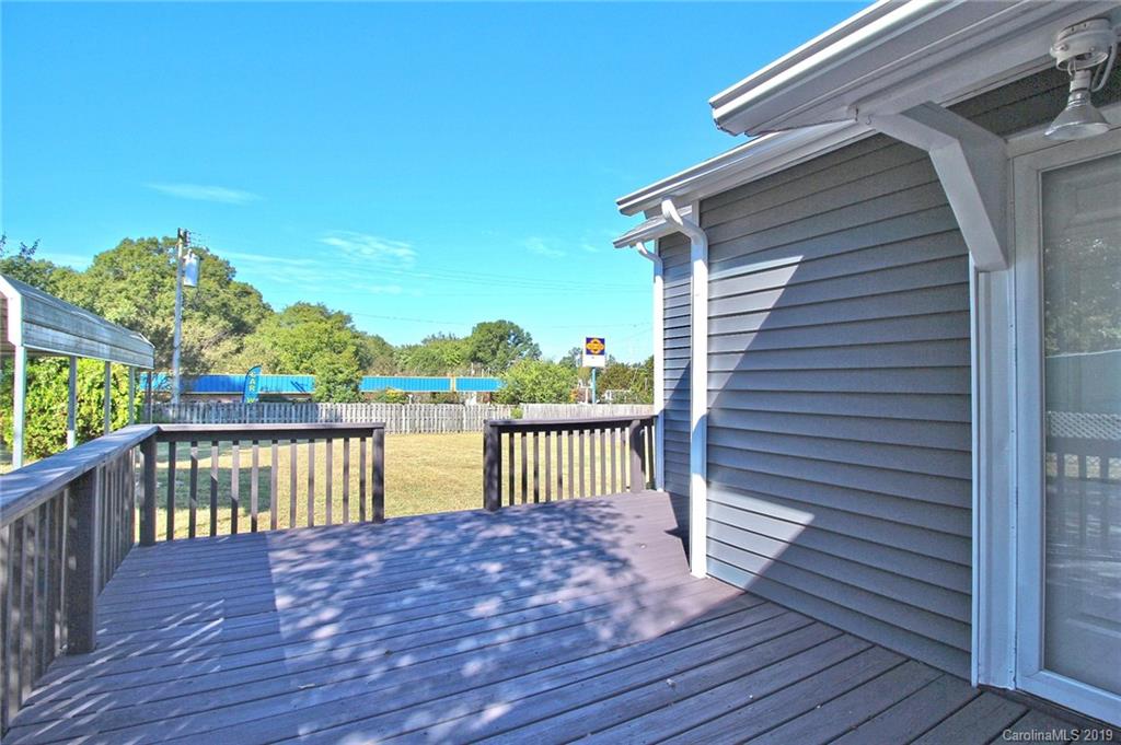 694 Main Street Southwest Concord, NC 28027 - Photo 25 of 33 a view of a deck with a chair