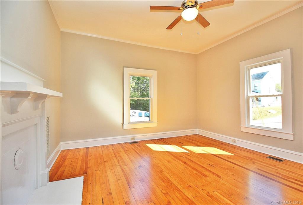 694 Main Street Southwest Concord, NC 28027 - Photo 9 of 33 a view of an empty room with a window