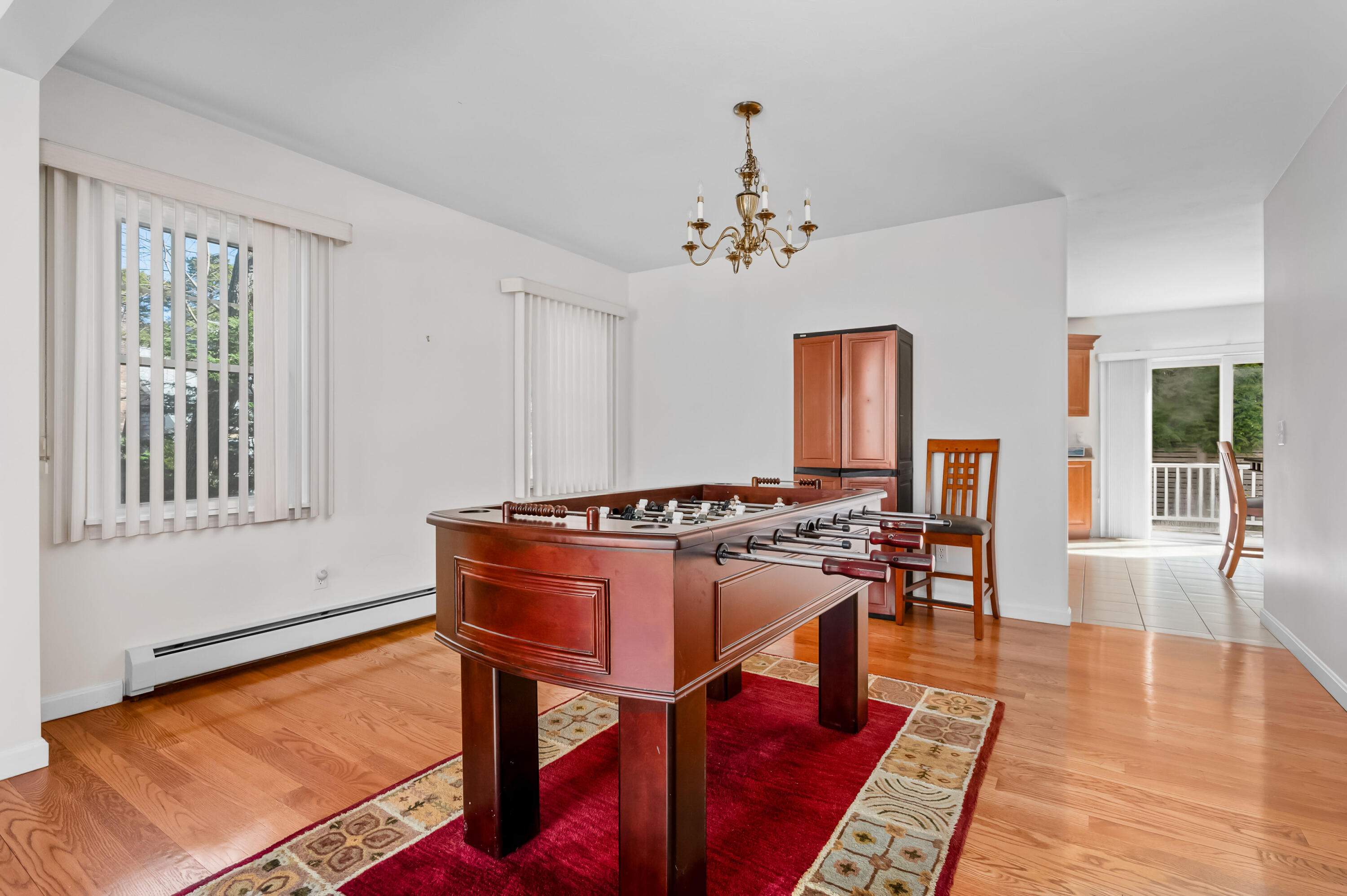 2 Centerville Avenue Centerville, MA 02632 - Photo 15 of 40 a living room with furniture a rug and a window