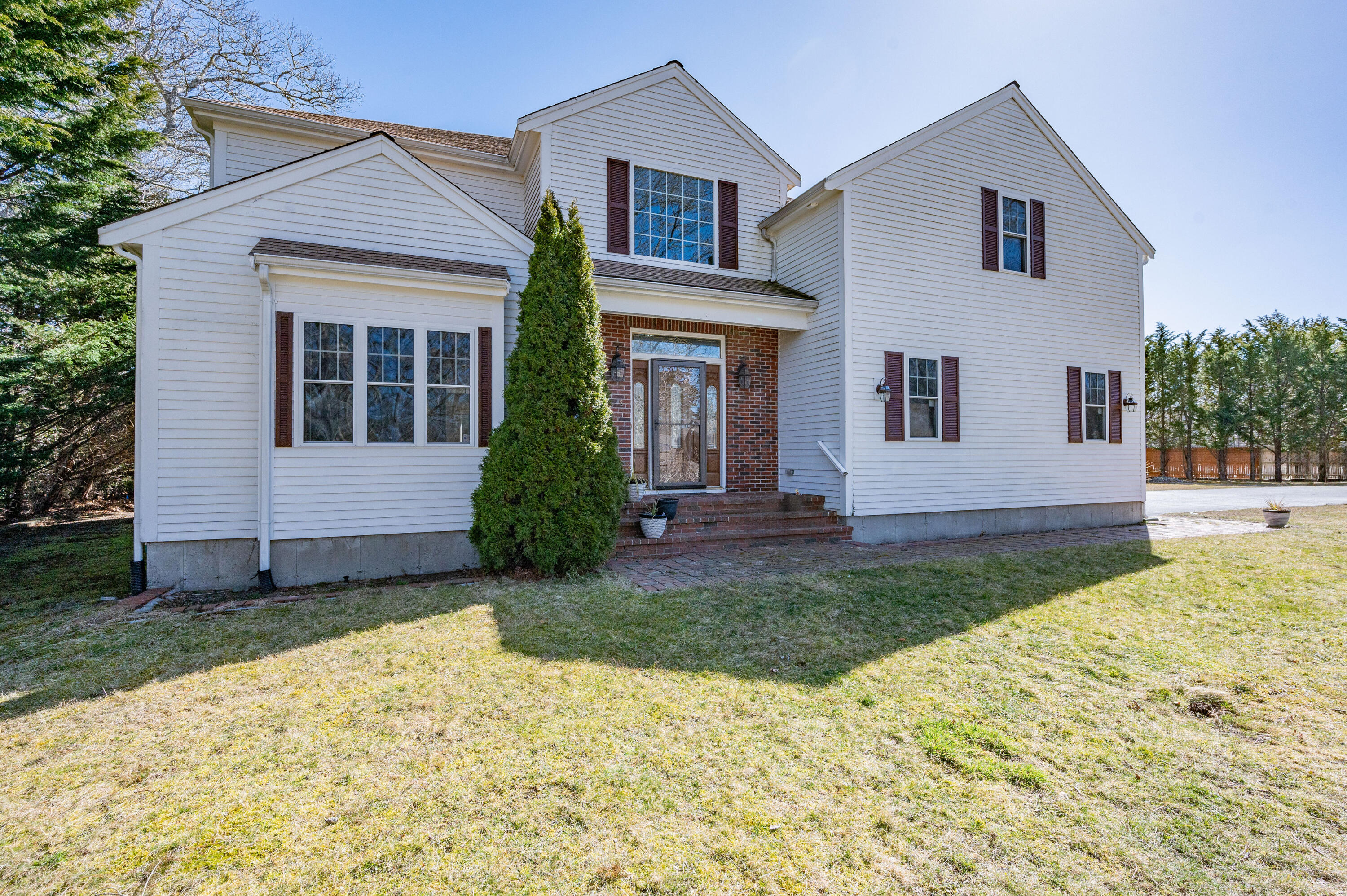 2 Centerville Avenue Centerville, MA 02632 - Photo 2 of 40 front view of a house with a yard