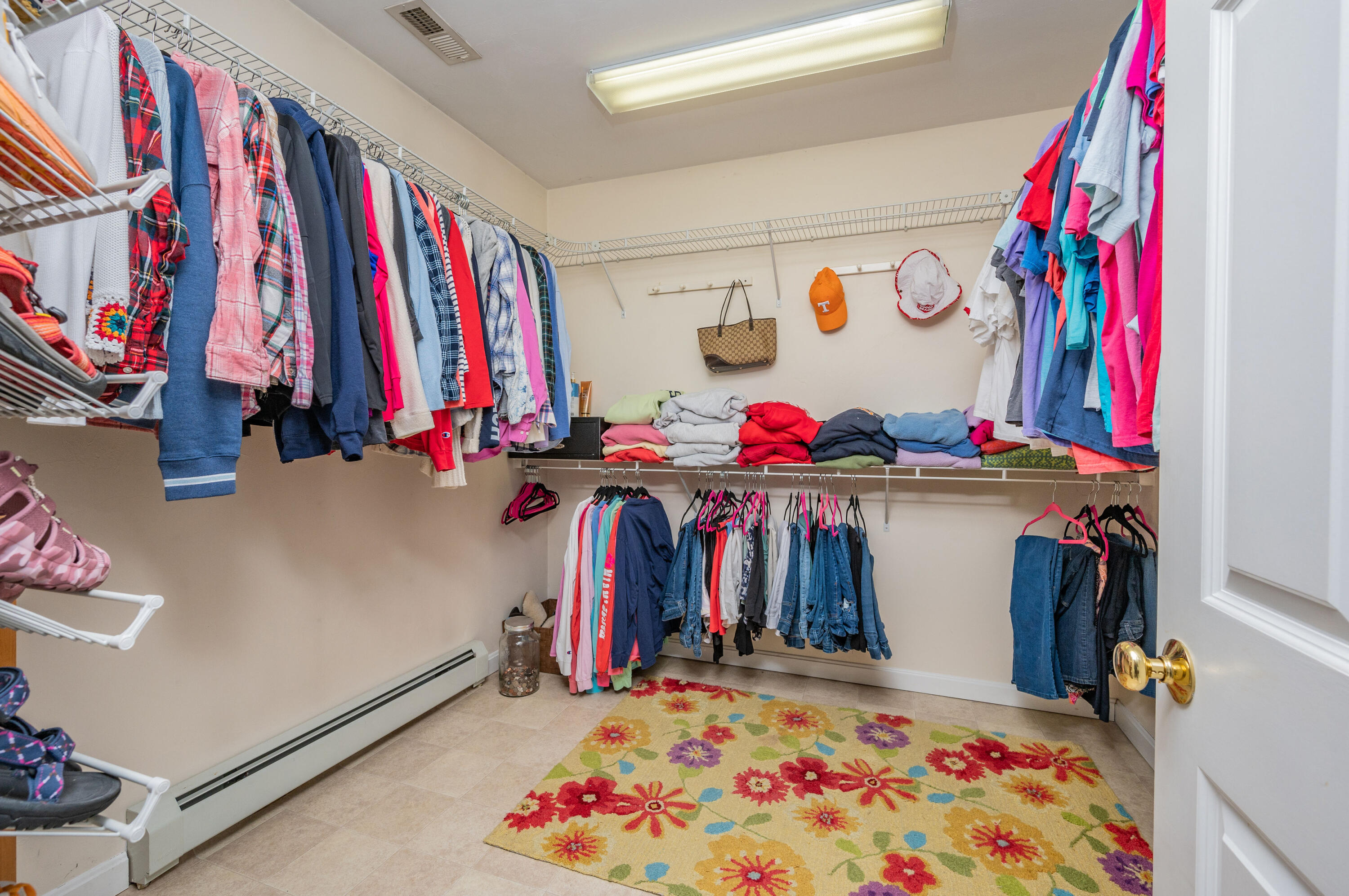 2 Centerville Avenue Centerville, MA 02632 - Photo 26 of 40 a view of walk in closet with clothes