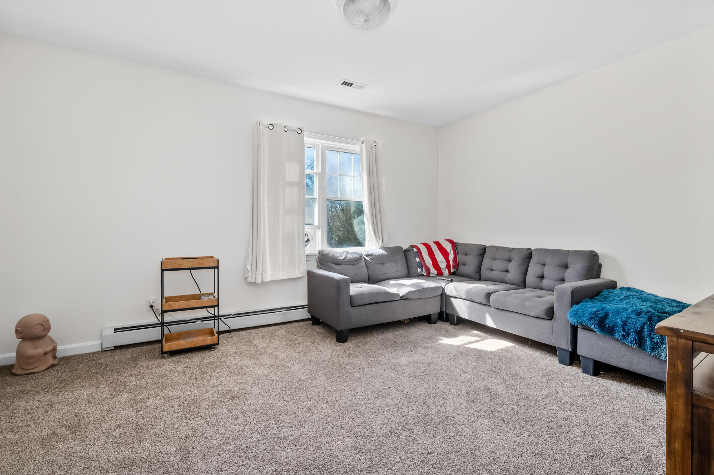 2 Centerville Avenue Centerville, MA 02632 - Photo 30 of 40 a living room with furniture and a window