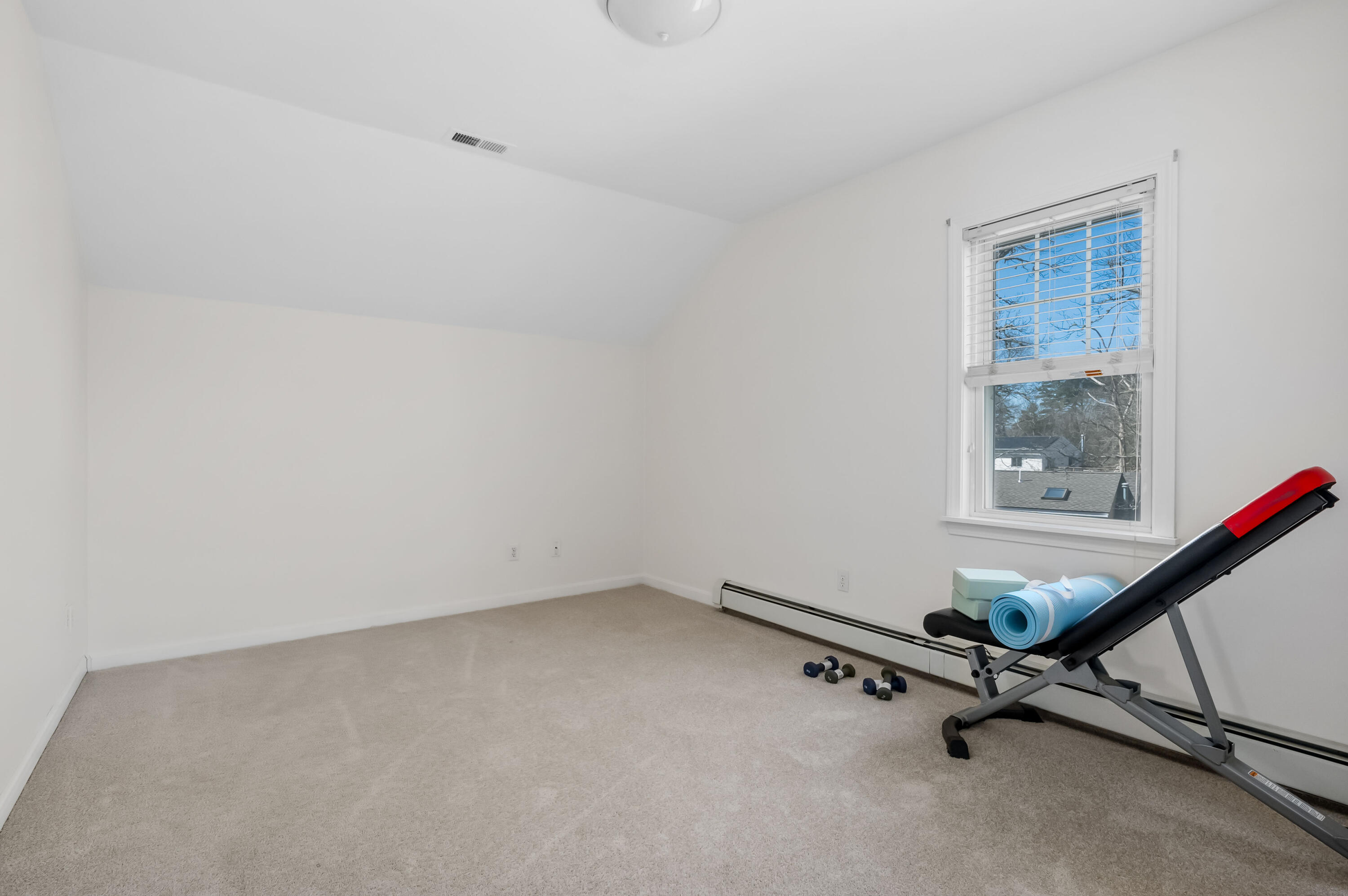 2 Centerville Avenue Centerville, MA 02632 - Photo 32 of 40 a room with gym equipment and windows