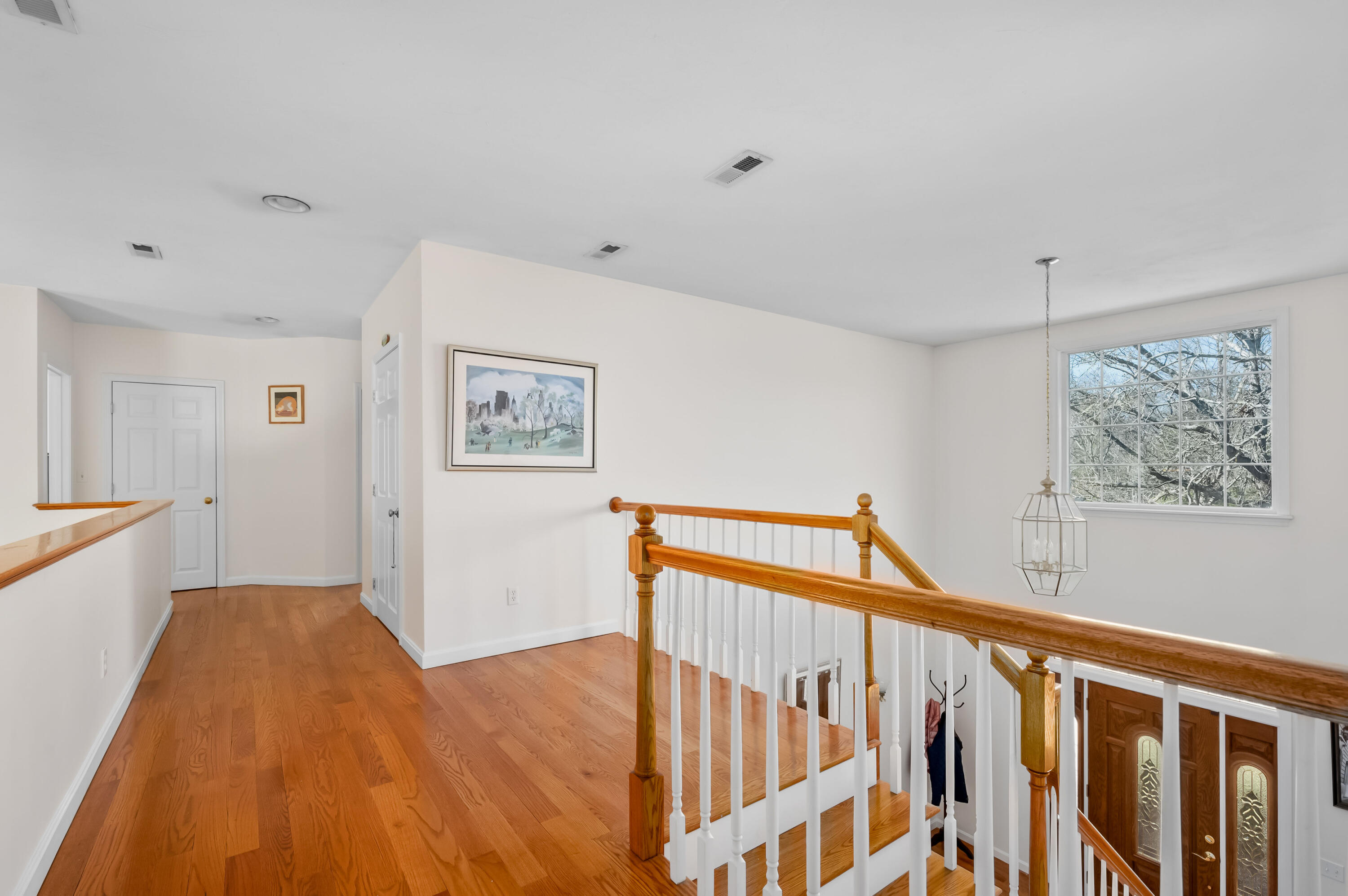 2 Centerville Avenue Centerville, MA 02632 - Photo 36 of 40 a view of hallway with a window and wooden floor