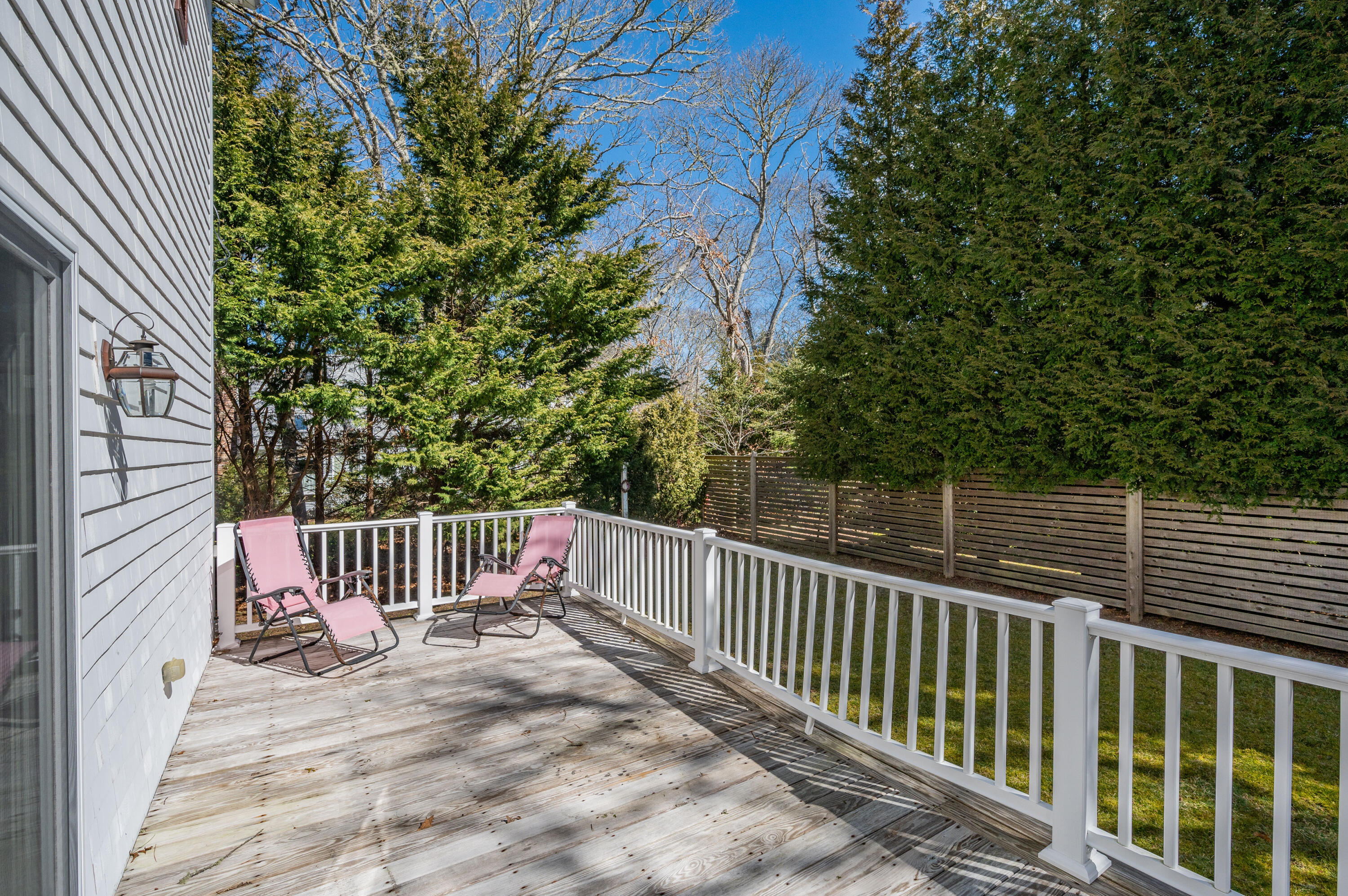 2 Centerville Avenue Centerville, MA 02632 - Photo 39 of 40 a view of a porch with a wooden fence