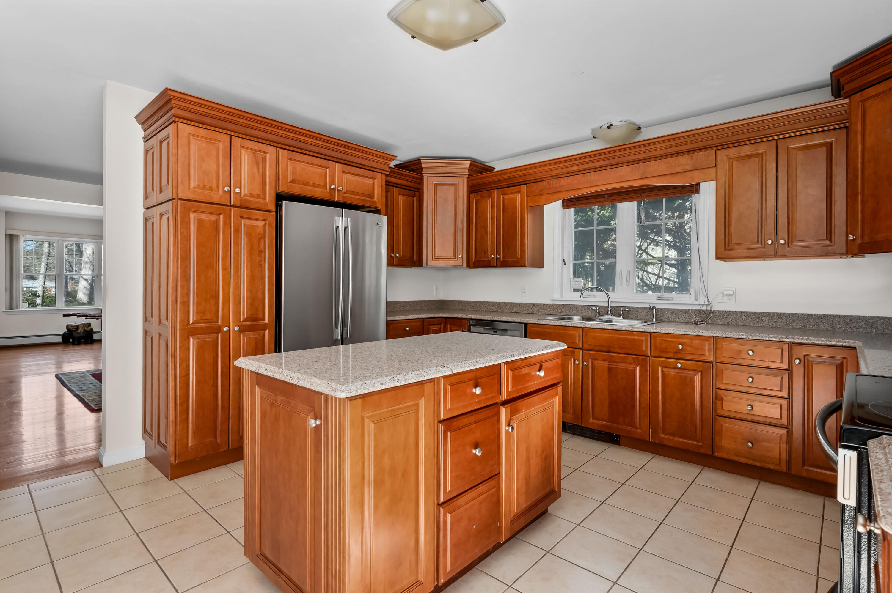 2 Centerville Avenue Centerville, MA 02632 - Photo 9 of 40 a kitchen with stainless steel appliances granite countertop a refrigerator and a sink