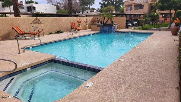 a view of a house with a swimming pool