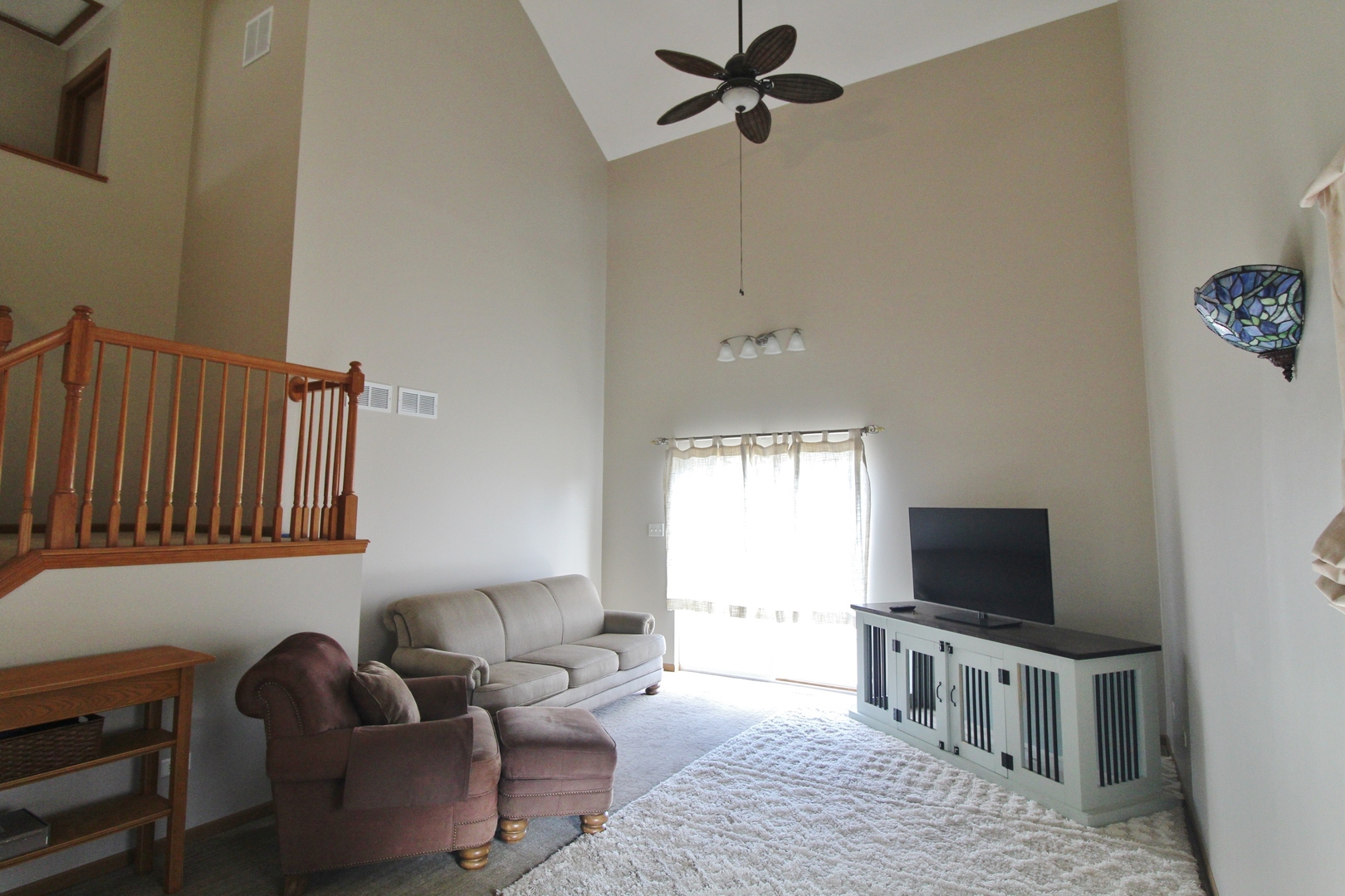 2005 Mountain Road Morris, IL 60450 - Photo 8 of 30 a living room with furniture and a flat screen tv