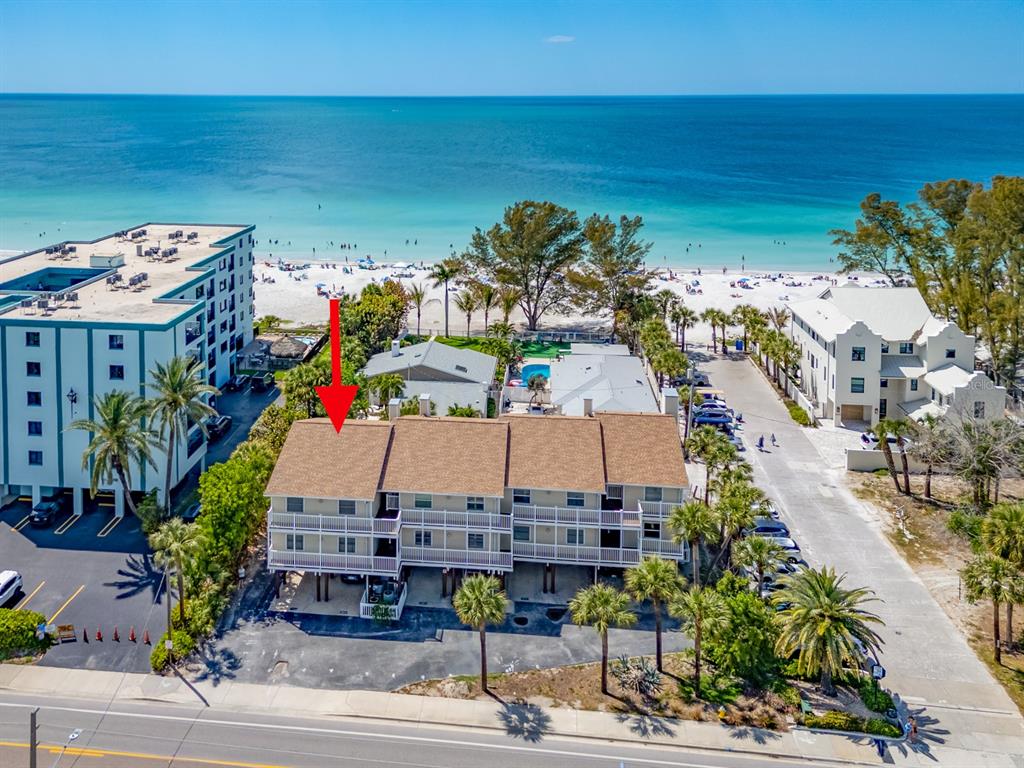 2406 Gulf Boulevard, Unit 204 Indian Rocks Beach, FL 33785 - Photo 1 of 39 an aerial view of multiple house