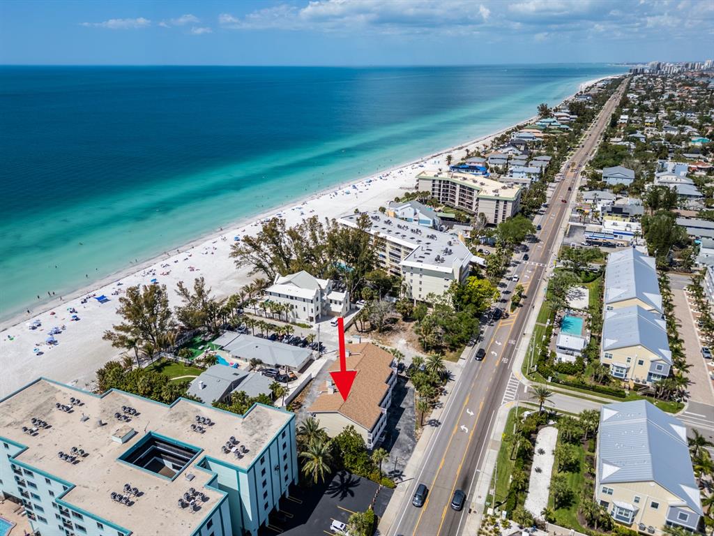 2406 Gulf Boulevard, Unit 204 Indian Rocks Beach, FL 33785 - Photo 38 of 39 an aerial view of a house with a yard