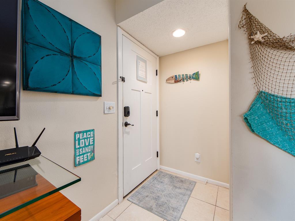 2406 Gulf Boulevard, Unit 204 Indian Rocks Beach, FL 33785 - Photo 5 of 39 a view of a hallway with elevator