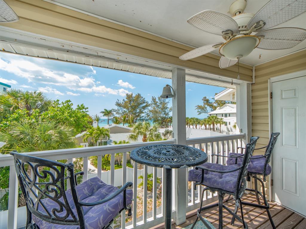 2406 Gulf Boulevard, Unit 204 Indian Rocks Beach, FL 33785 - Photo 8 of 39 a view of a dining room with furniture window and outside view