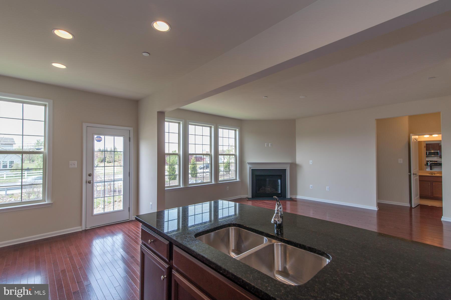 8153 Ridgely Loop Severn, MD 21144 - Photo 12 of 30 Kitchen View of Family Room