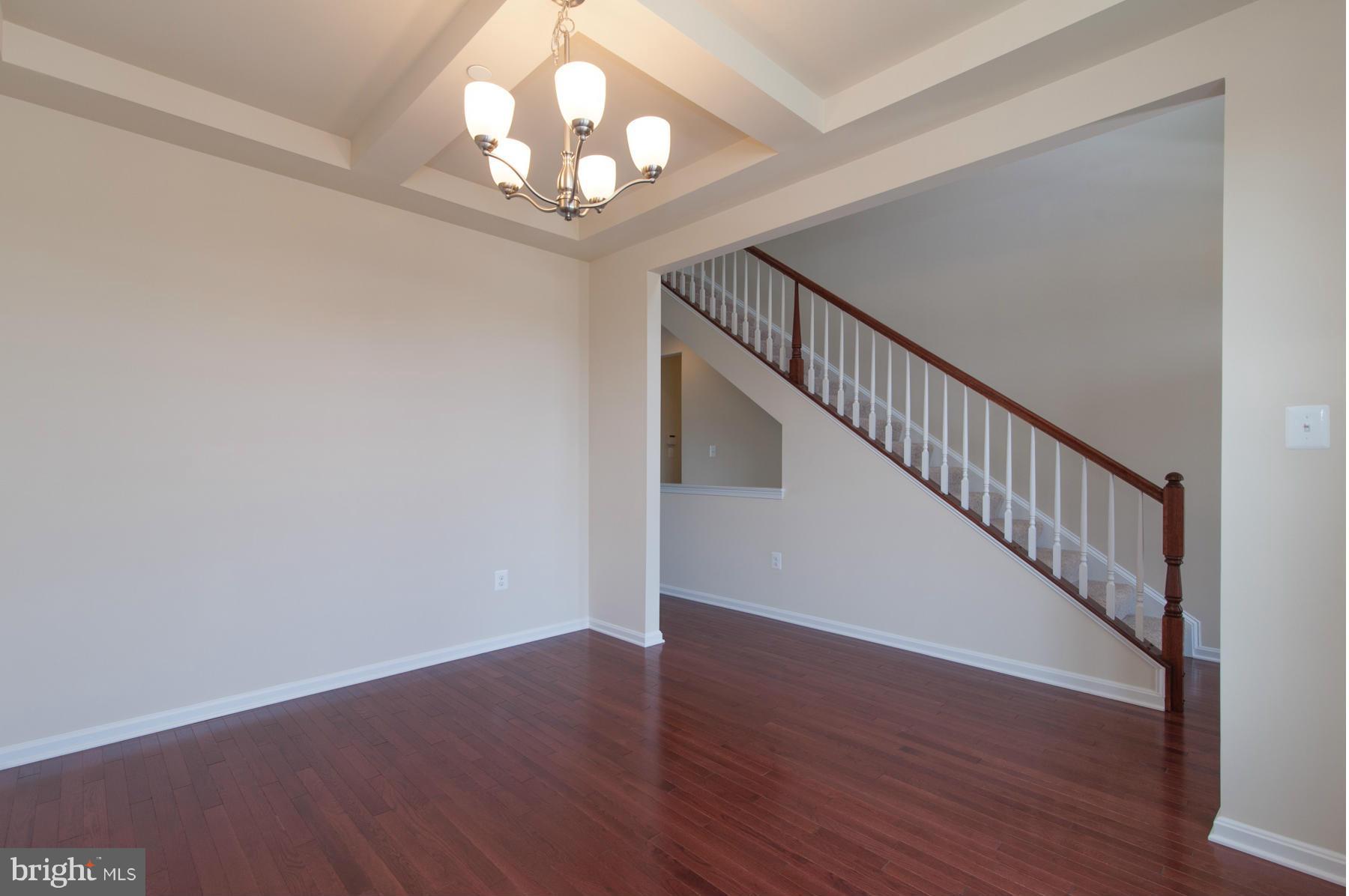 8153 Ridgely Loop Severn, MD 21144 - Photo 16 of 30 Dining Room with Coffered Ceiling