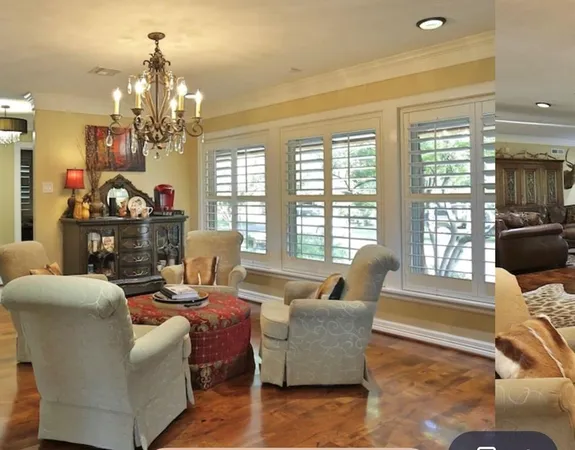 a bathroom with a granite countertop sink a mirror and shower